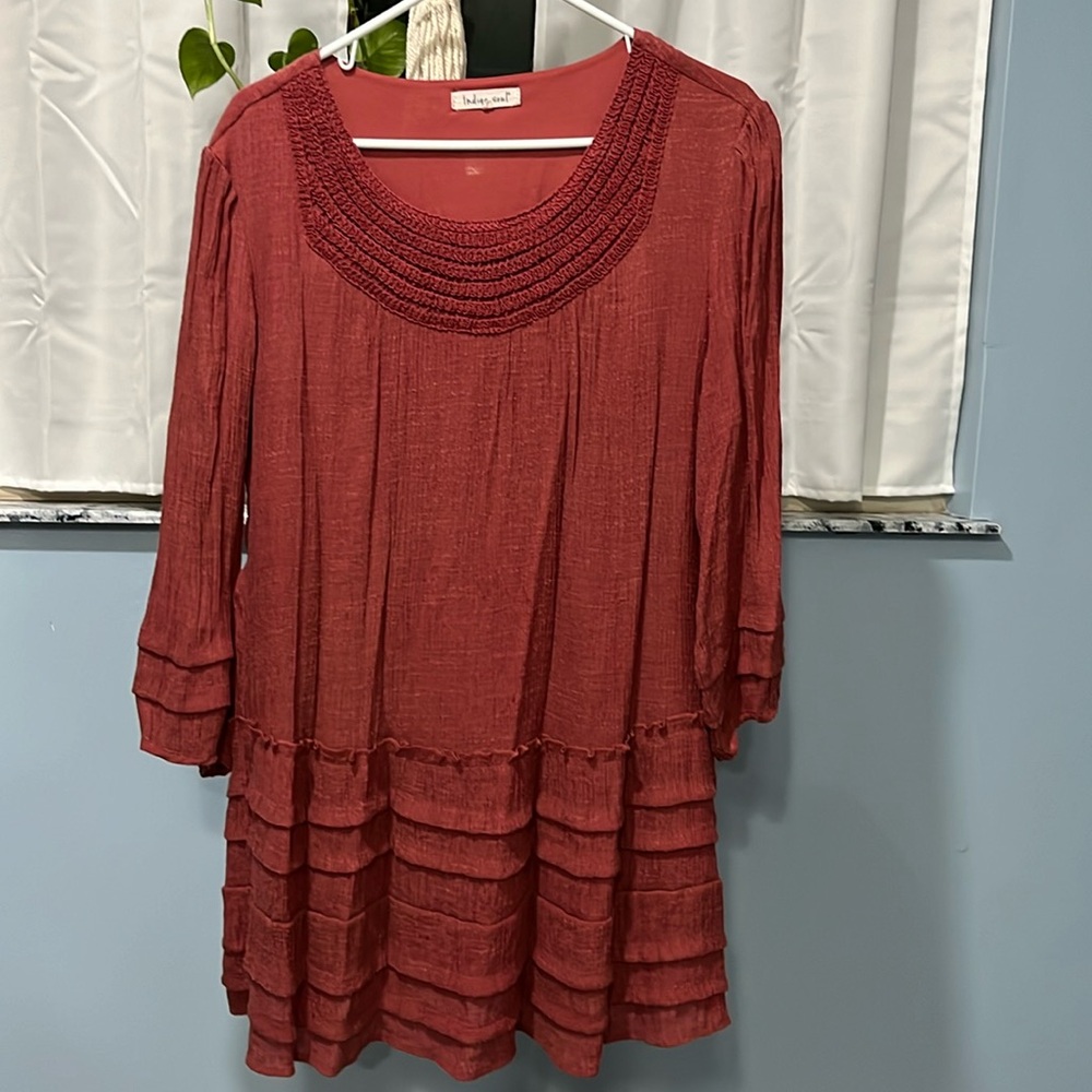 Burnt orange ruffled top